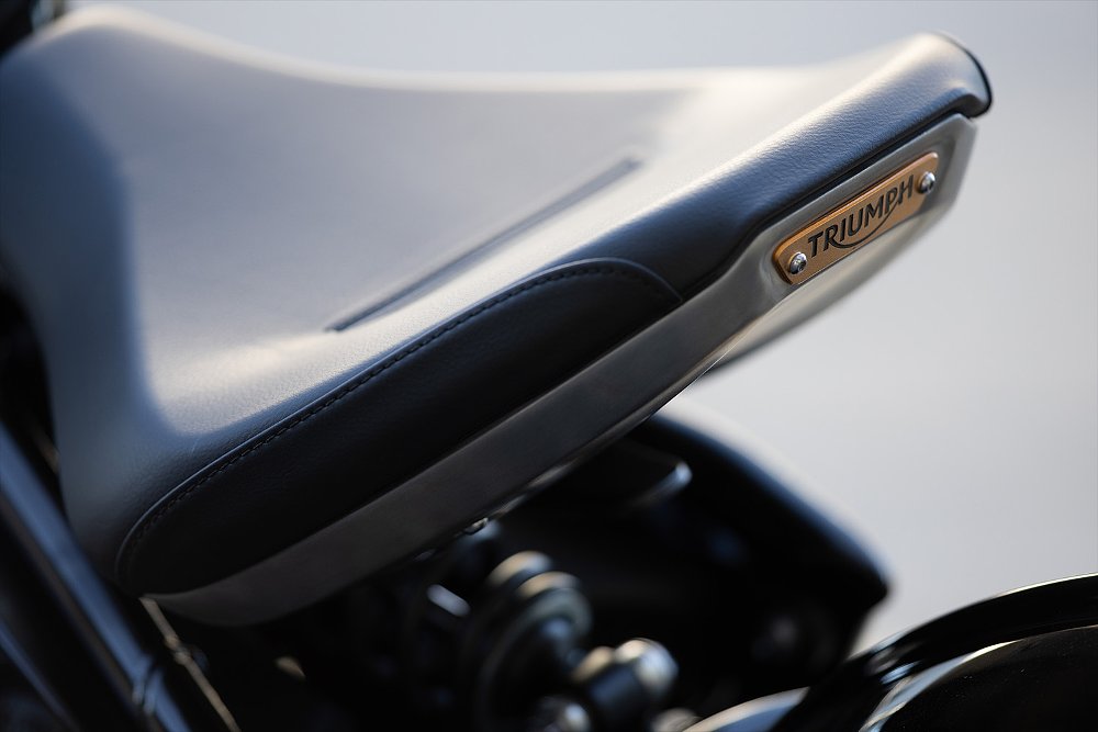 A close-up of the Bobber's floating seat and rear shock.