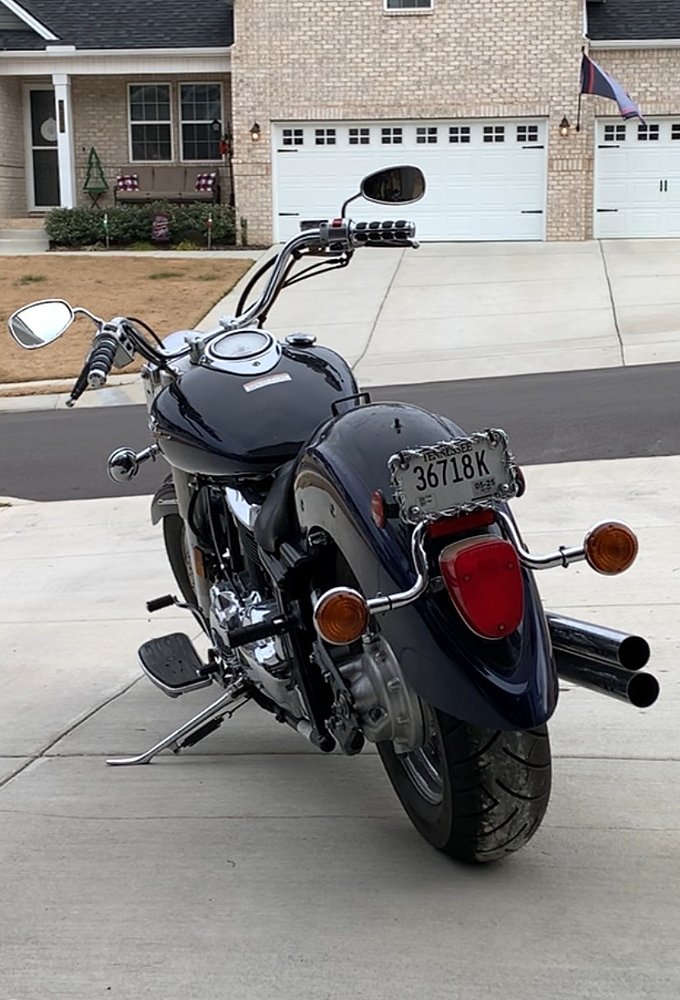 view from the rear of the dark blue V-Star Classic in the driveway
