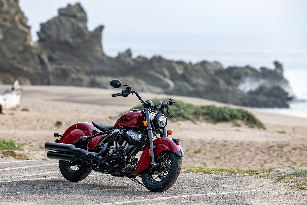 The 2026 Chief Vintage shot on a Southern California beach with the shore and rock formations in the background.