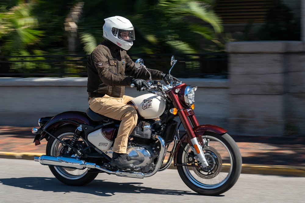 side view of a rider on the Classic 650 on a city street