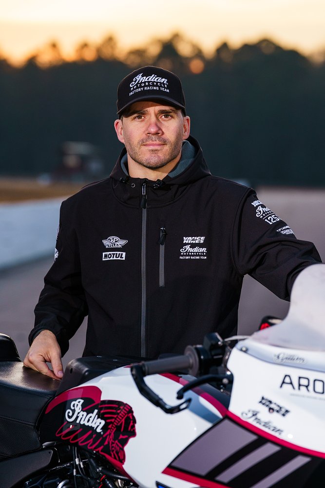 Hayden Gillim posing with his race motorcycle