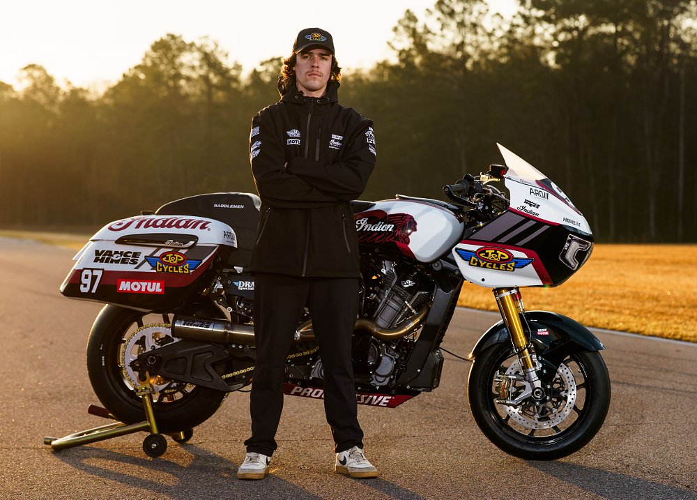 Rocco Landers posing with his race bike