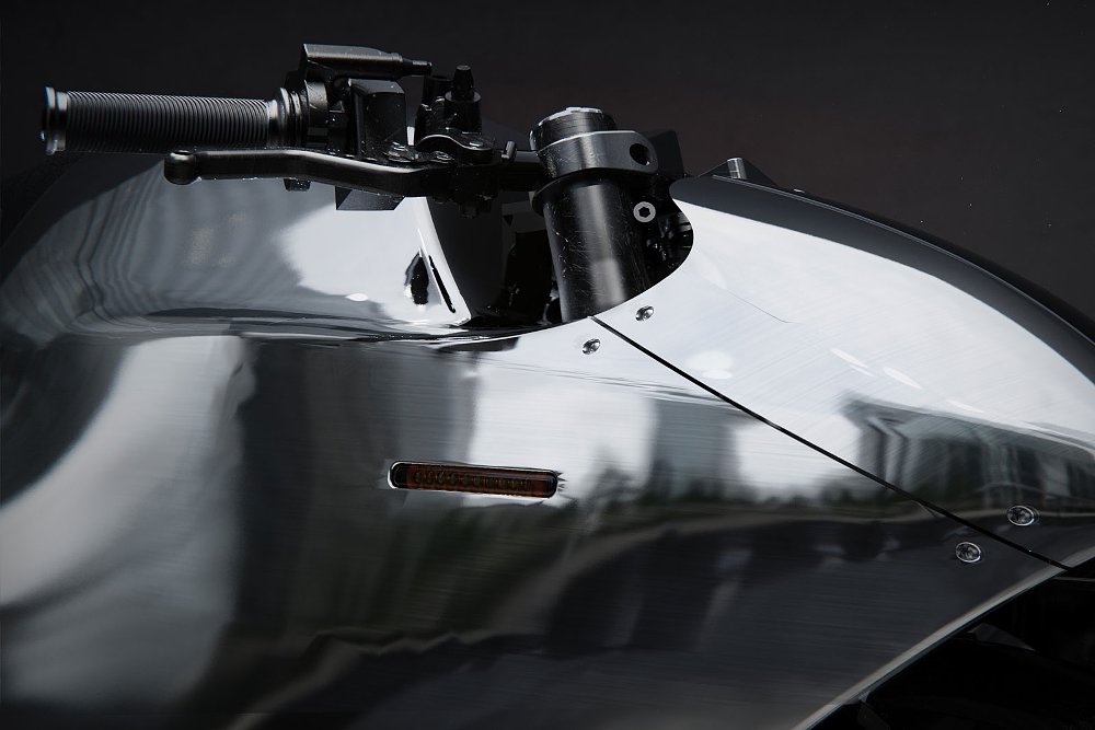 close view of the shiny metal fairing