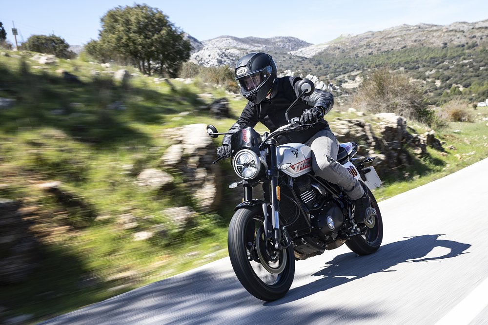 riding the black Tracker on a mountain road in Spain