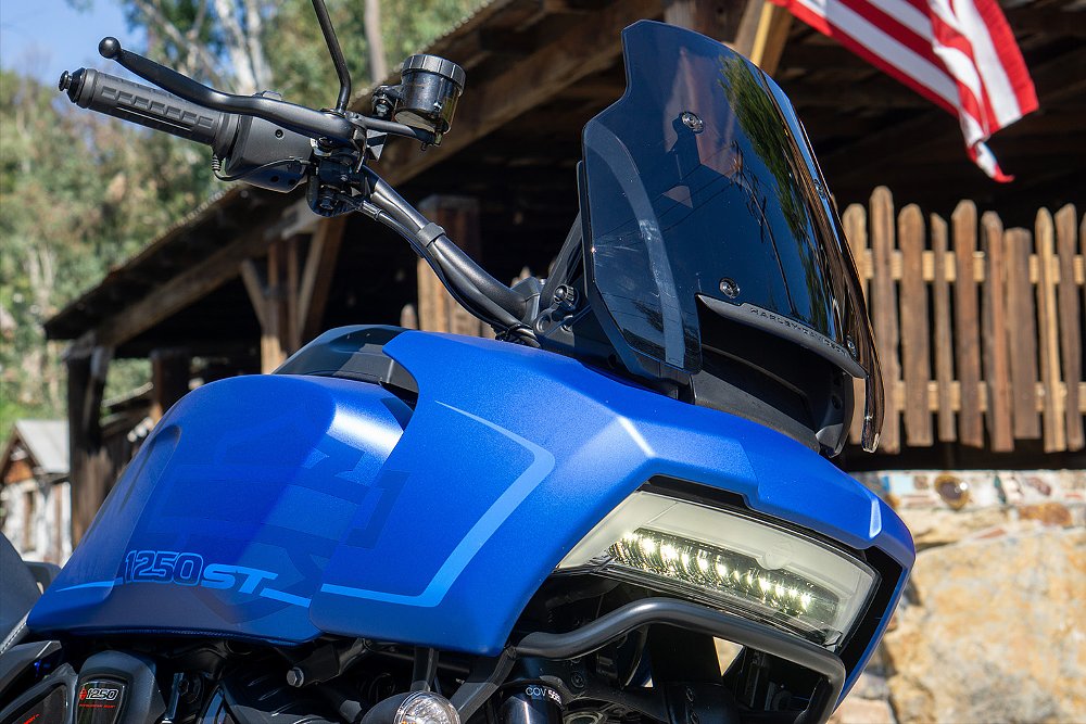 A close-up of the Pan America ST's front fairing and shortened windscreen.