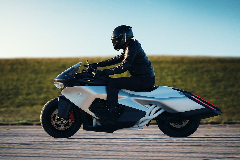 A rider guides the Vision K18 over an airport runway.