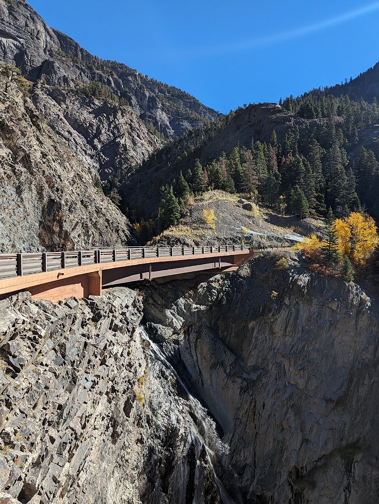 curving viaduct high on a rocky mountainside