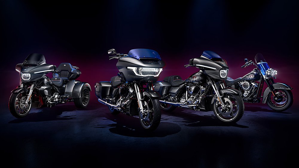 The four bikes in Harley-Davidson's Liberty Enthusiast Collection lined up in a dimly lit studio.