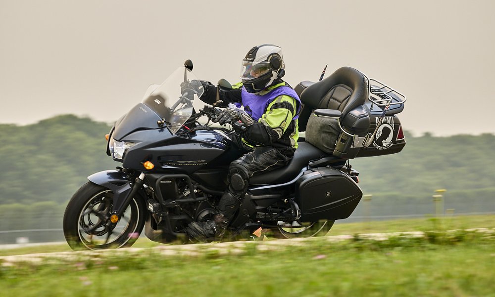 riding on the track, leaned over on his CTX700