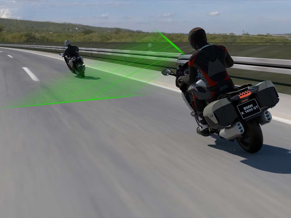 illustration showing how a BMW motorcycle uses radar to detect the distance to another motorcycle ahead on the road
