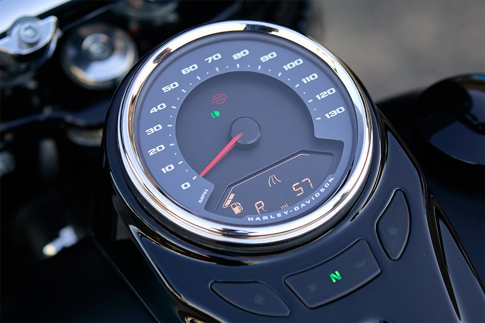 A close up of the Deadwood's round speedometer.