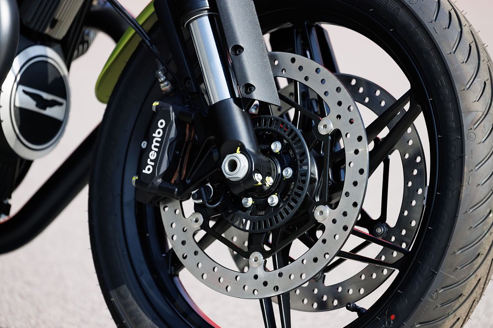 close view of front wheel, brakes, and suspension on the V7 Sport
