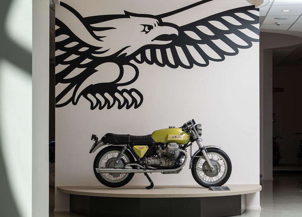 original V7 Sport on a pedestal in the museum