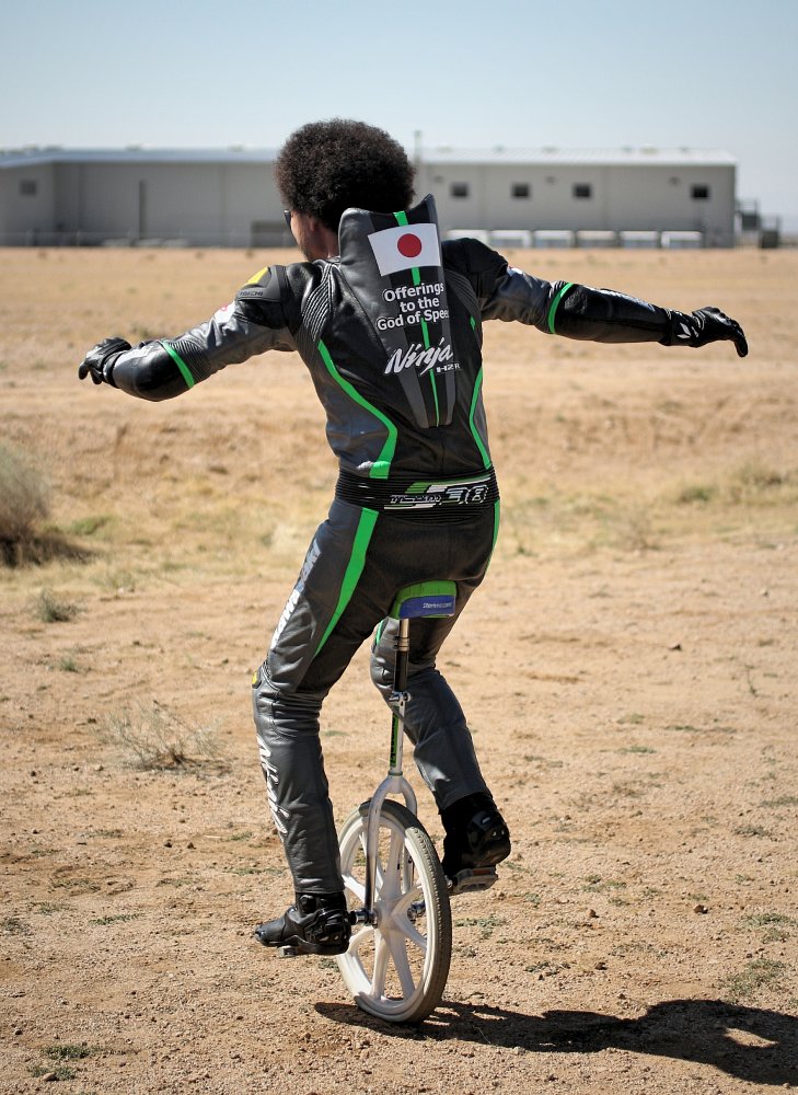 Shigeru Yamasiata on a unicycle