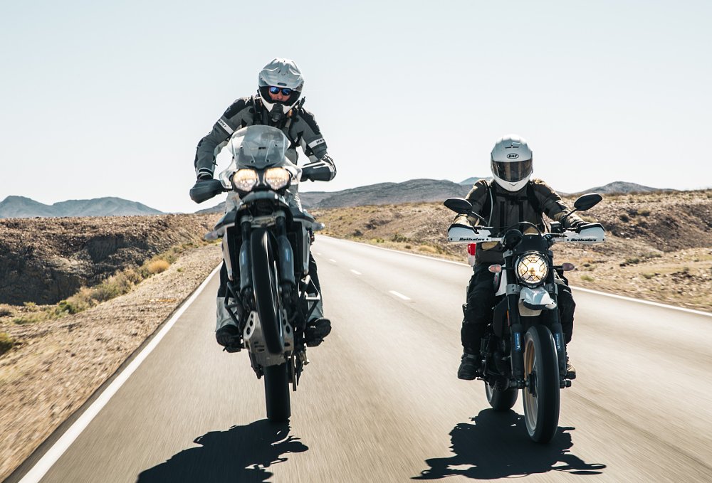 brothers riding in the desert
