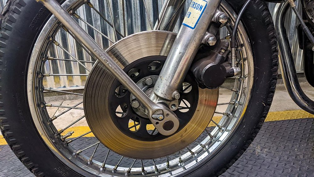 Breaking motorcycle front axle nut