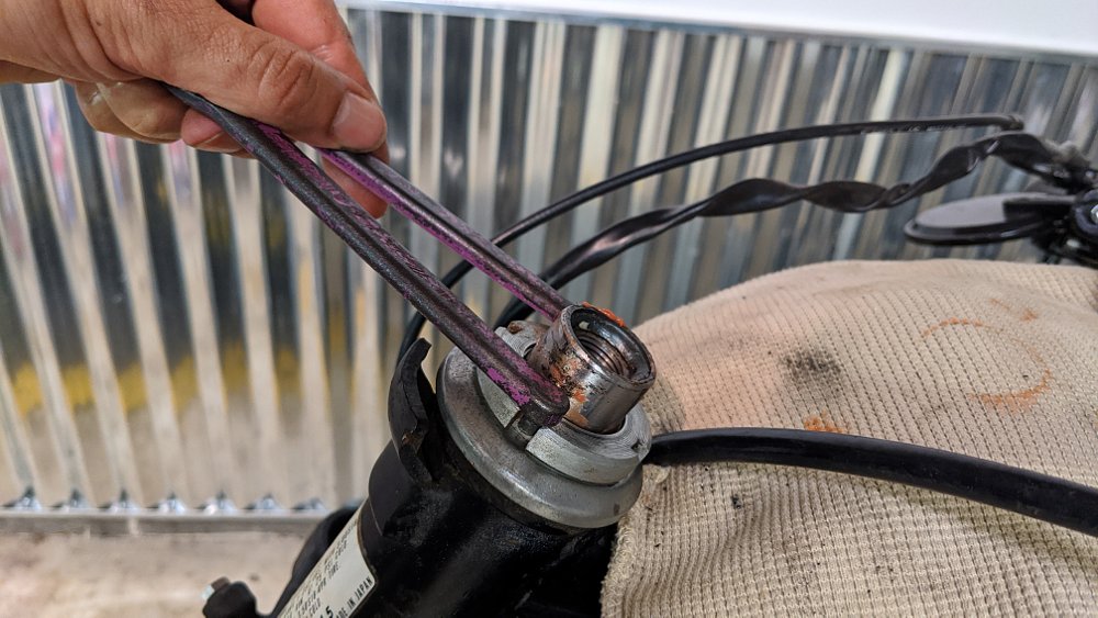 Adjusting steering stem nut