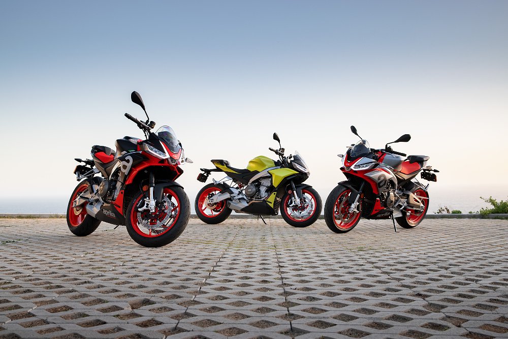 The three colors of Aprilia Tuono 660; silver, black, acid gold