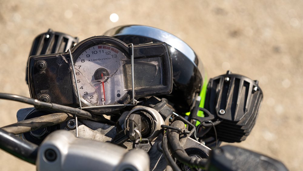 Baling wire holding the dash in place on a Kawasaki Versys 650