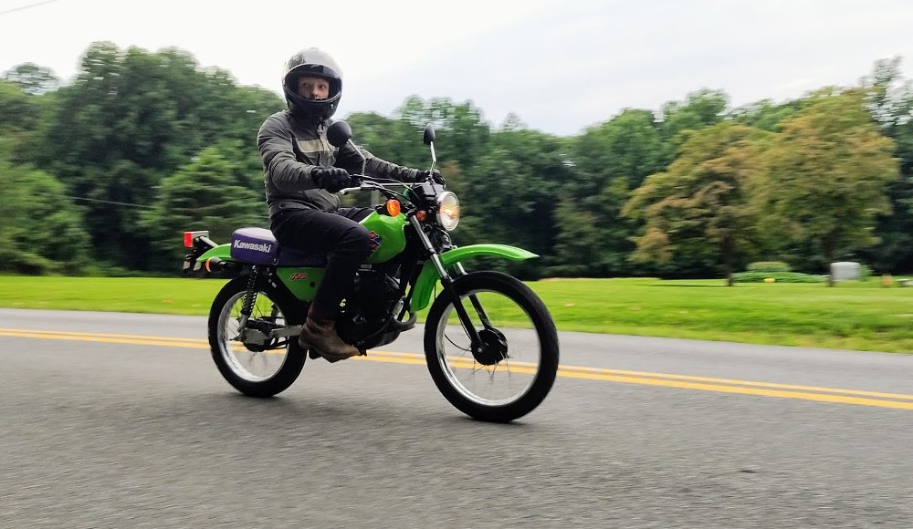 a rider on the Kawasaki KE100