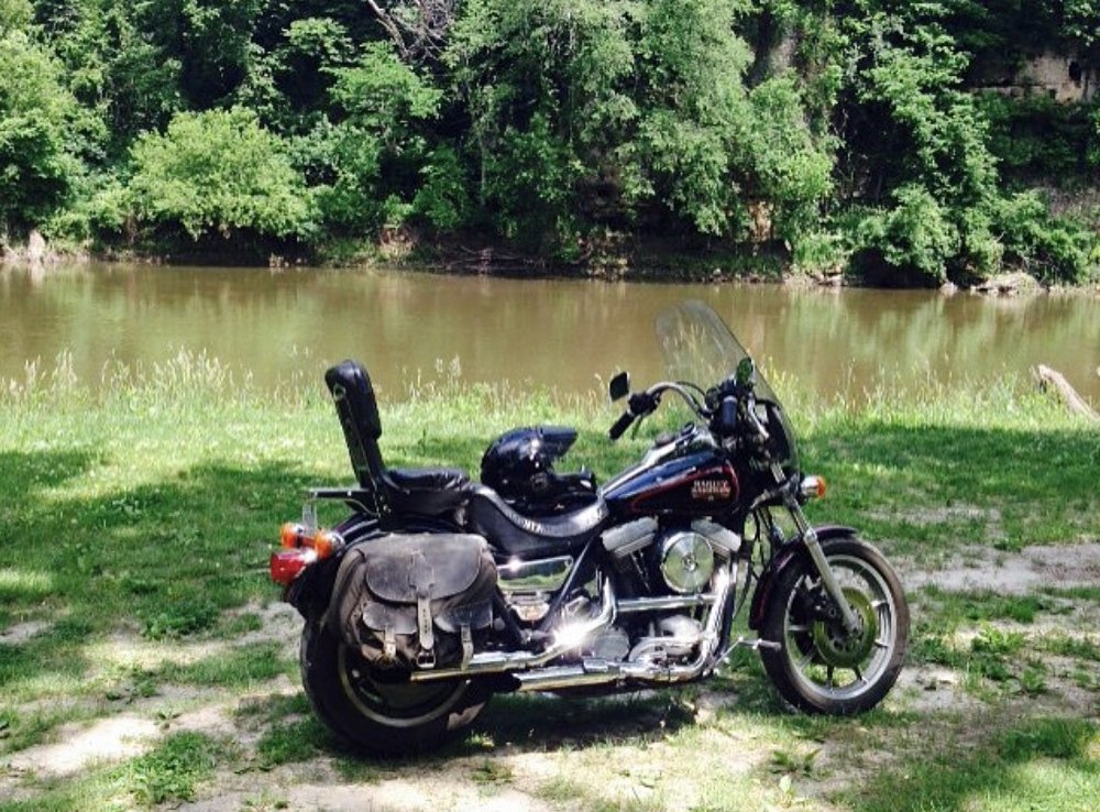 FXR parked by a country stream