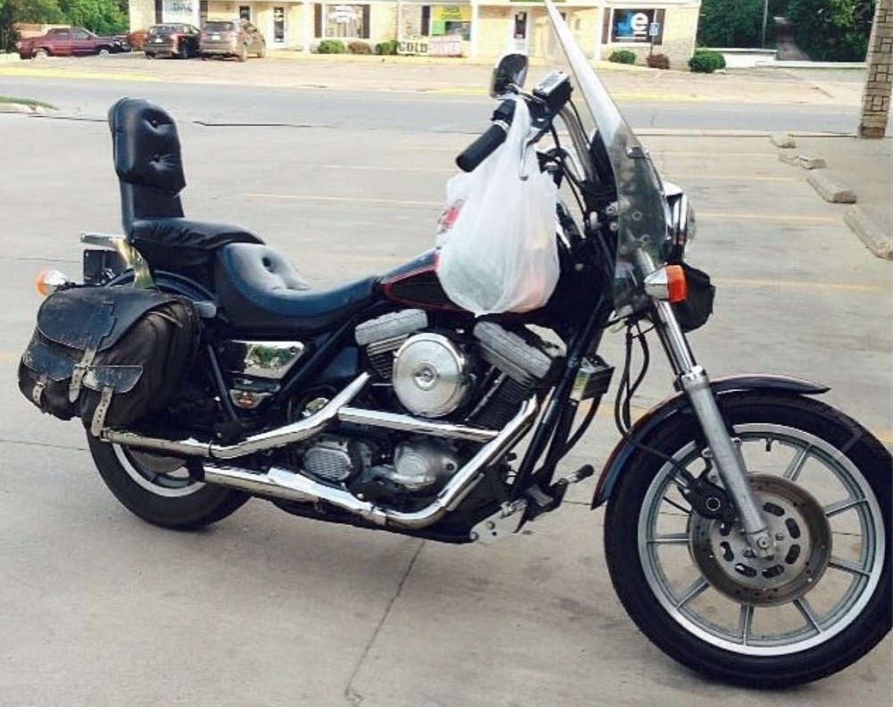 FXR with a grocery bag hanging from the handlebar