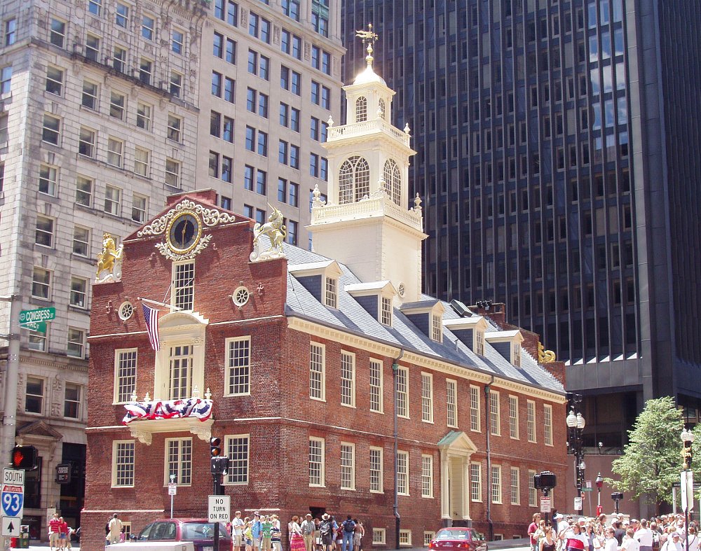 a photo of the old colonial State House in downtown Boston MA