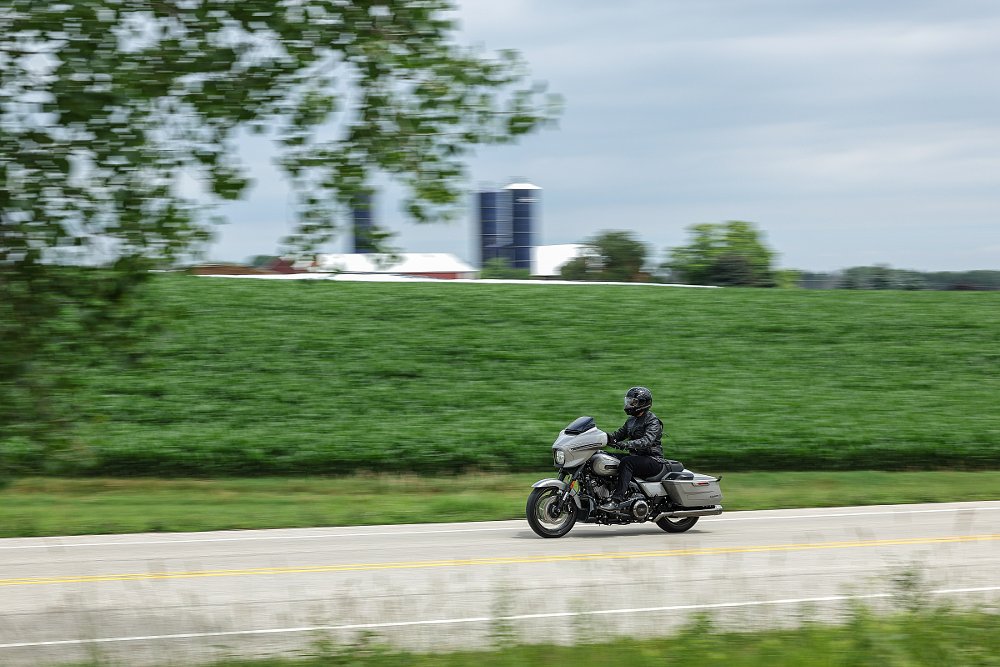 CVO Street Glide on a road passing a farm