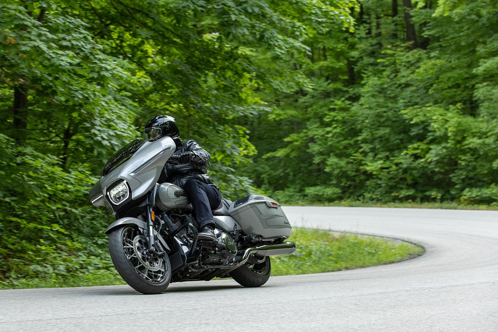 Harley-Davidson CVO Street Glide ridden on a curve in a country road