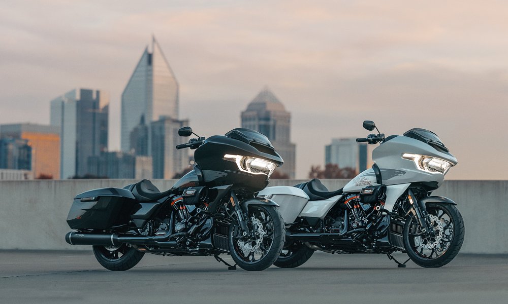 two CVO Road Glide STs in front of a city skyline