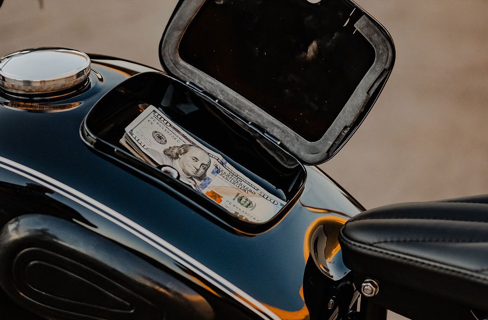 storage space in tank with cash inside