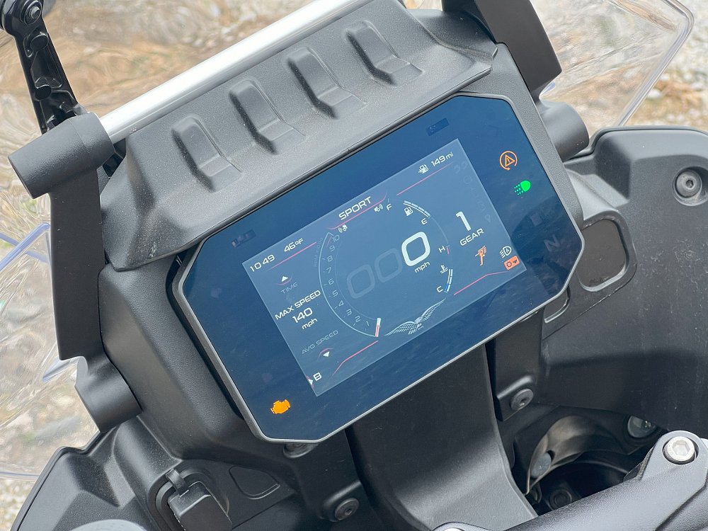 view of digital dash showing max speed of 140 kph