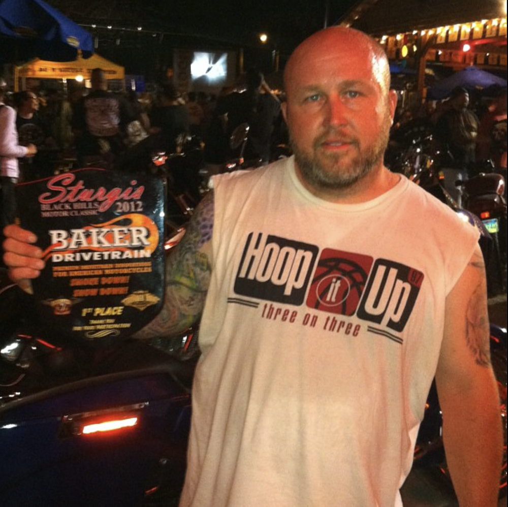 Sweaty Patrick holding the winner's plate