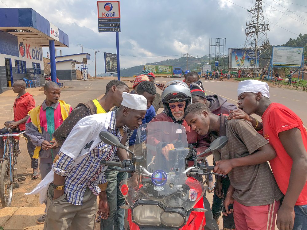 rider in Africa talking to locasl