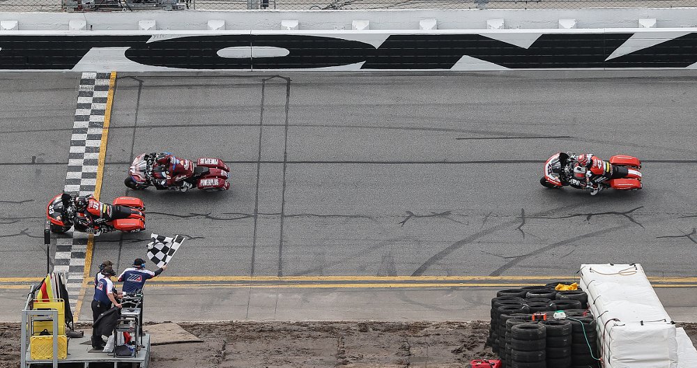 Baggers race bike crossing the finish line a tenth of a second apart at Daytona