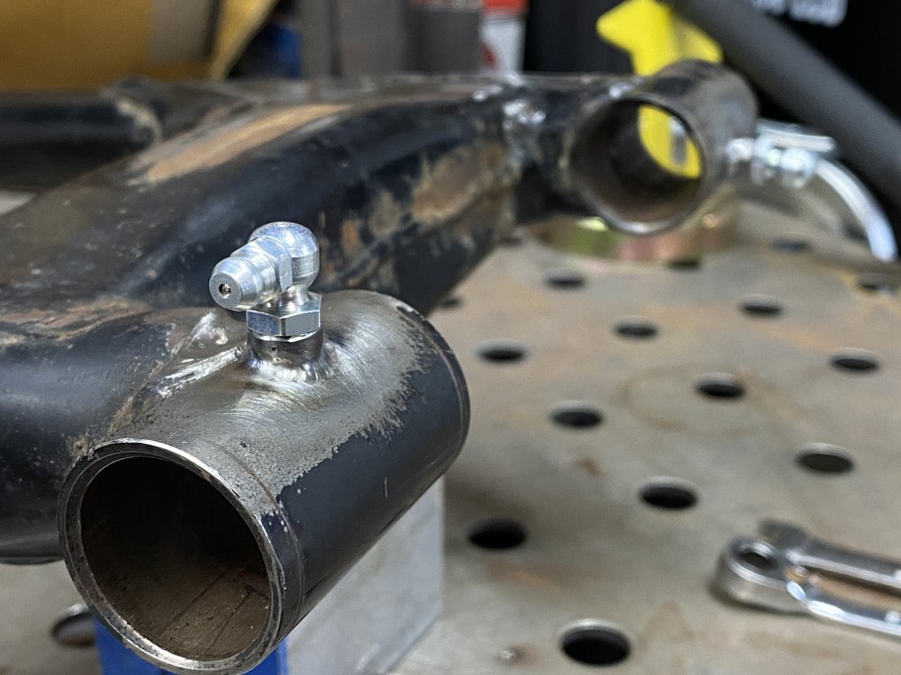 Grease fittings on the XL250 swingarm.