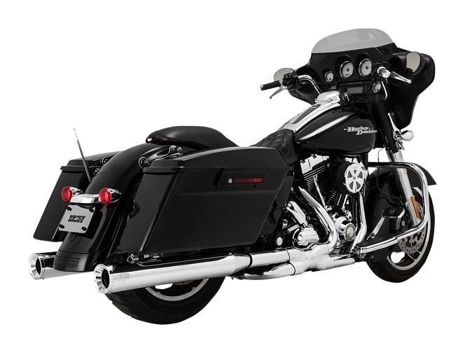 a Harley-Davidson bagger with Vance & Hines chrome mufflers