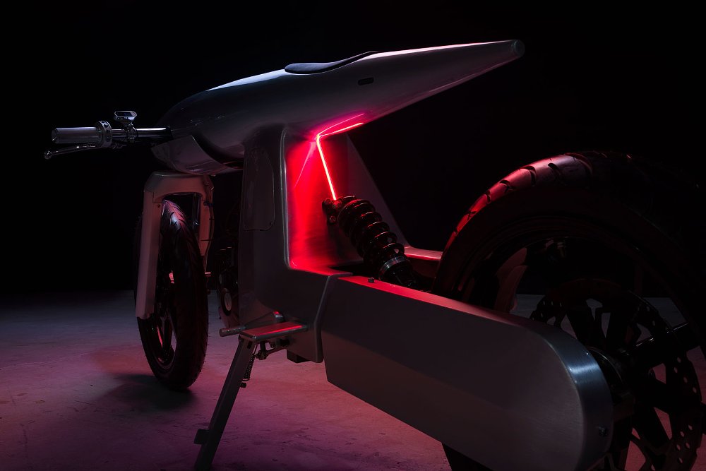 rear view of the motorcycle with a narrow vertical red light