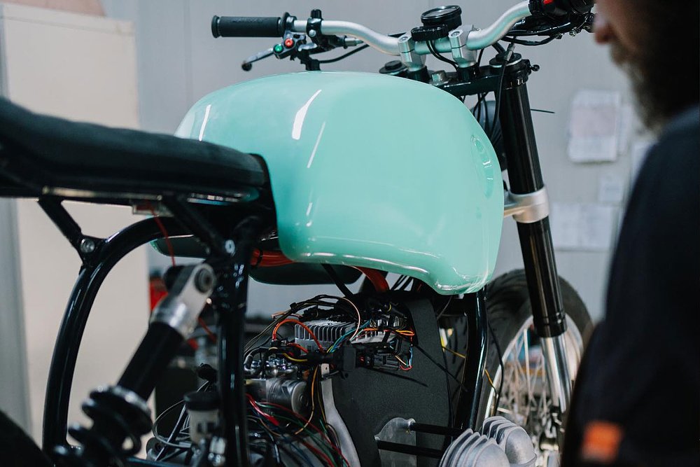 photo of the teal green faux tank that holds the batteries