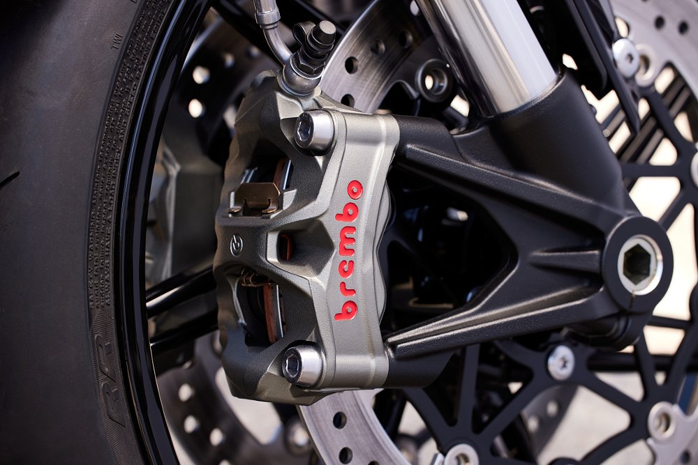 closeup photo of the Brembo caliper on the front brakes of the Speed Twin 1200 RS