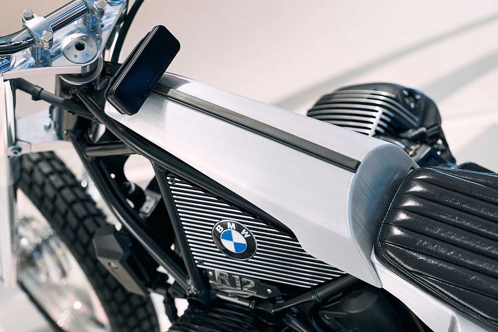 view from above of the slim, silver faux fuel tank