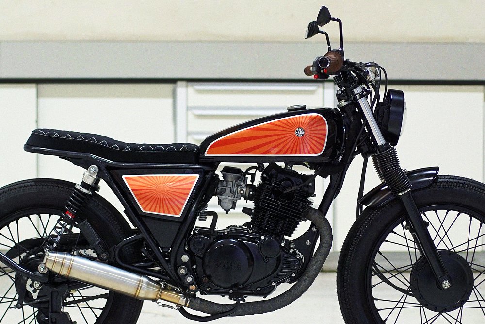 side view of the SR250's engine and exhaust