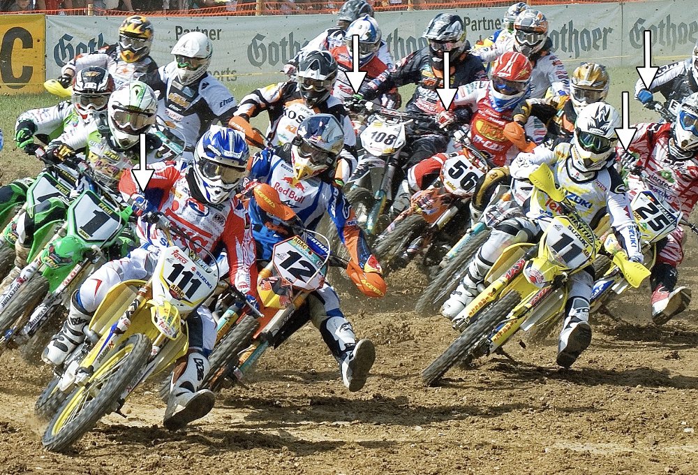 Motorcross riders covering the front brake