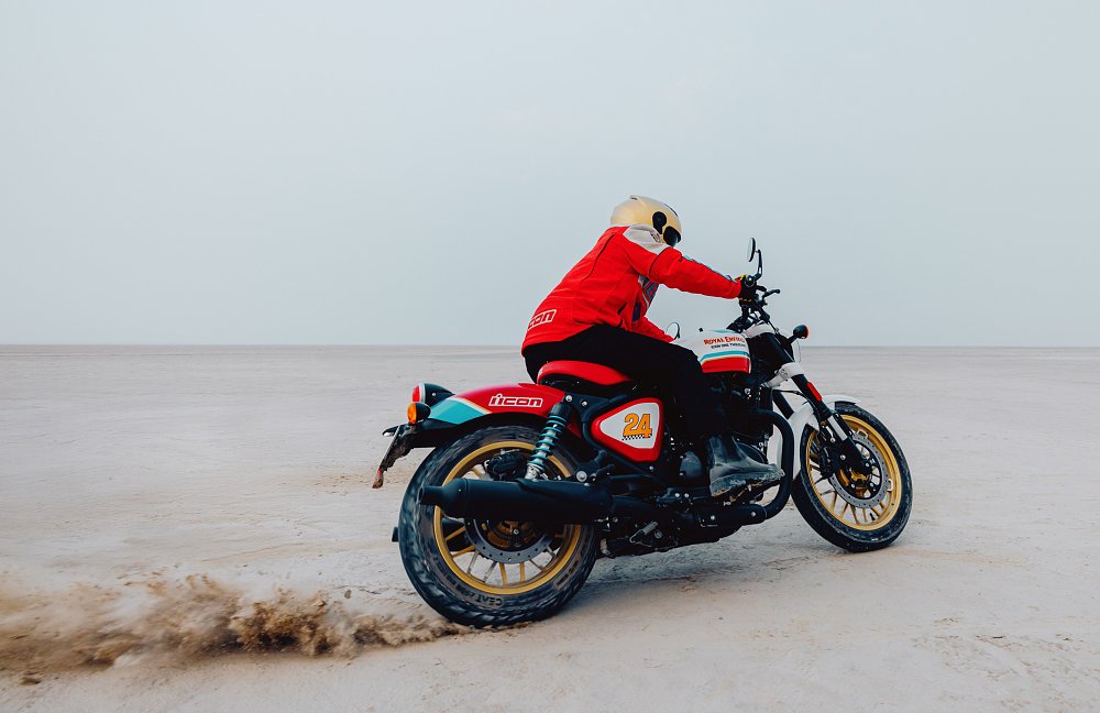 rider on the custom Royal Enfield on the salt flats
