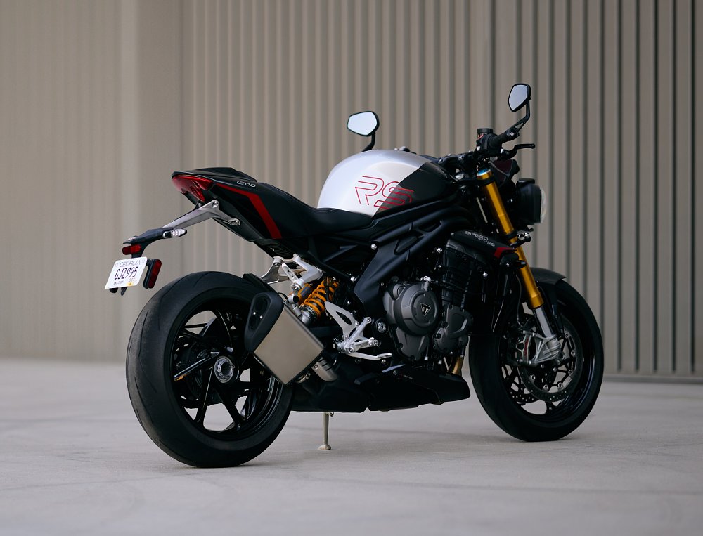 rear angle view of the Speed Triple 1200 RS showing the rear wheel and swingarm