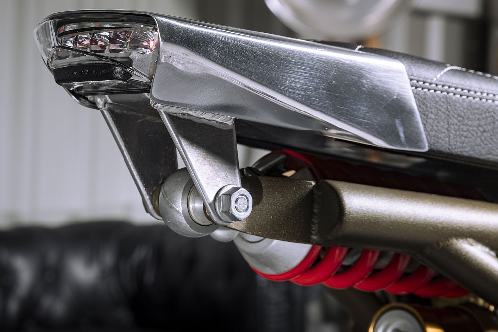 close view of the trim aluminum tail section and the shock underneath