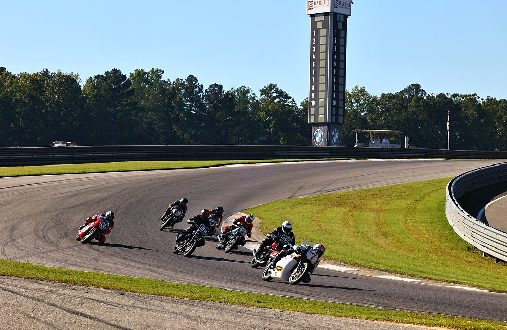vintage racers on the track at the festival