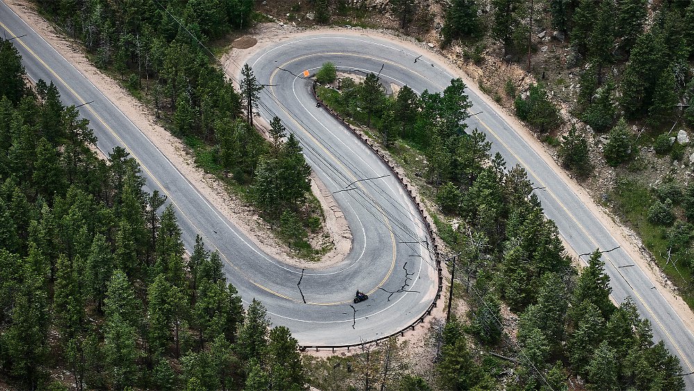 A bird's eye view of XDiavel riding through an S-curve.