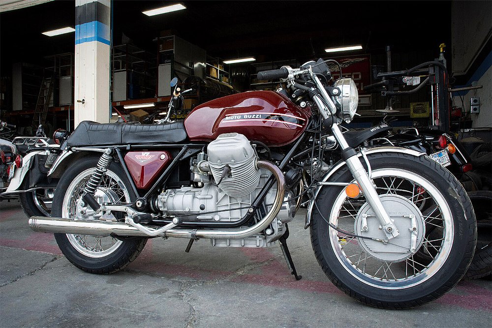 A shot of the side of Ewan McGregor's 1973 Moto Guzzi V7 Sport.
