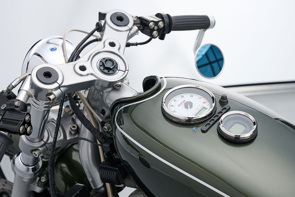 overhead view of clip-ons and faux fuel tank with inset gauges